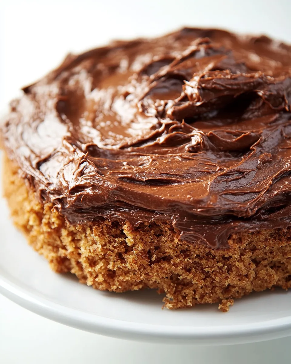 Delicious Healthy Whole Wheat Banana Cake with Creamy Greek Yogurt Chocolate Frosting shot