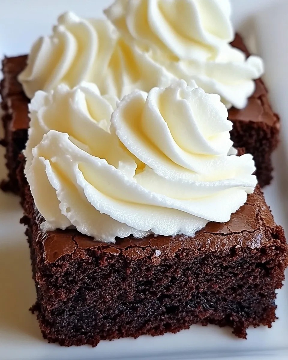 Easy Mascarpone Brownies with Whipped Cream food shot