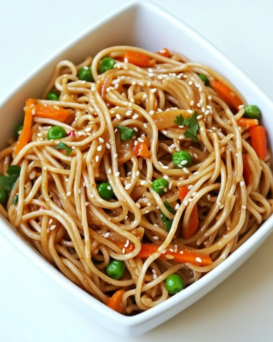 Classic Whole Wheat Noodles with Peanut Sauce and Vegetables Recipe image